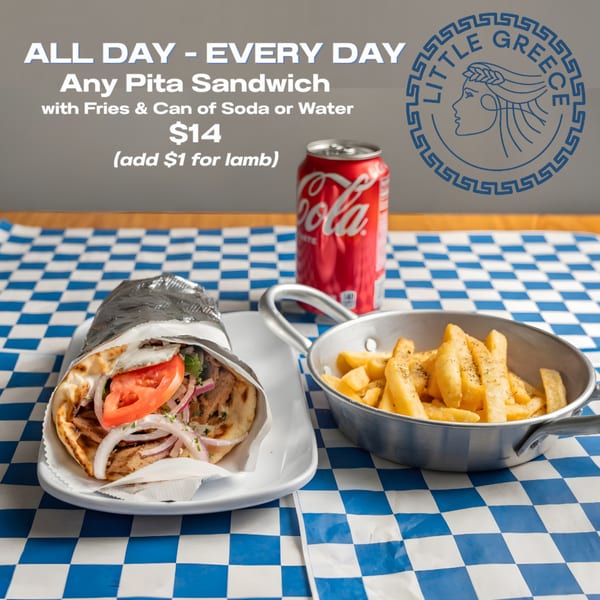 Little Greece pita sandwich with fries and a soda on a blue and white checkered paper.