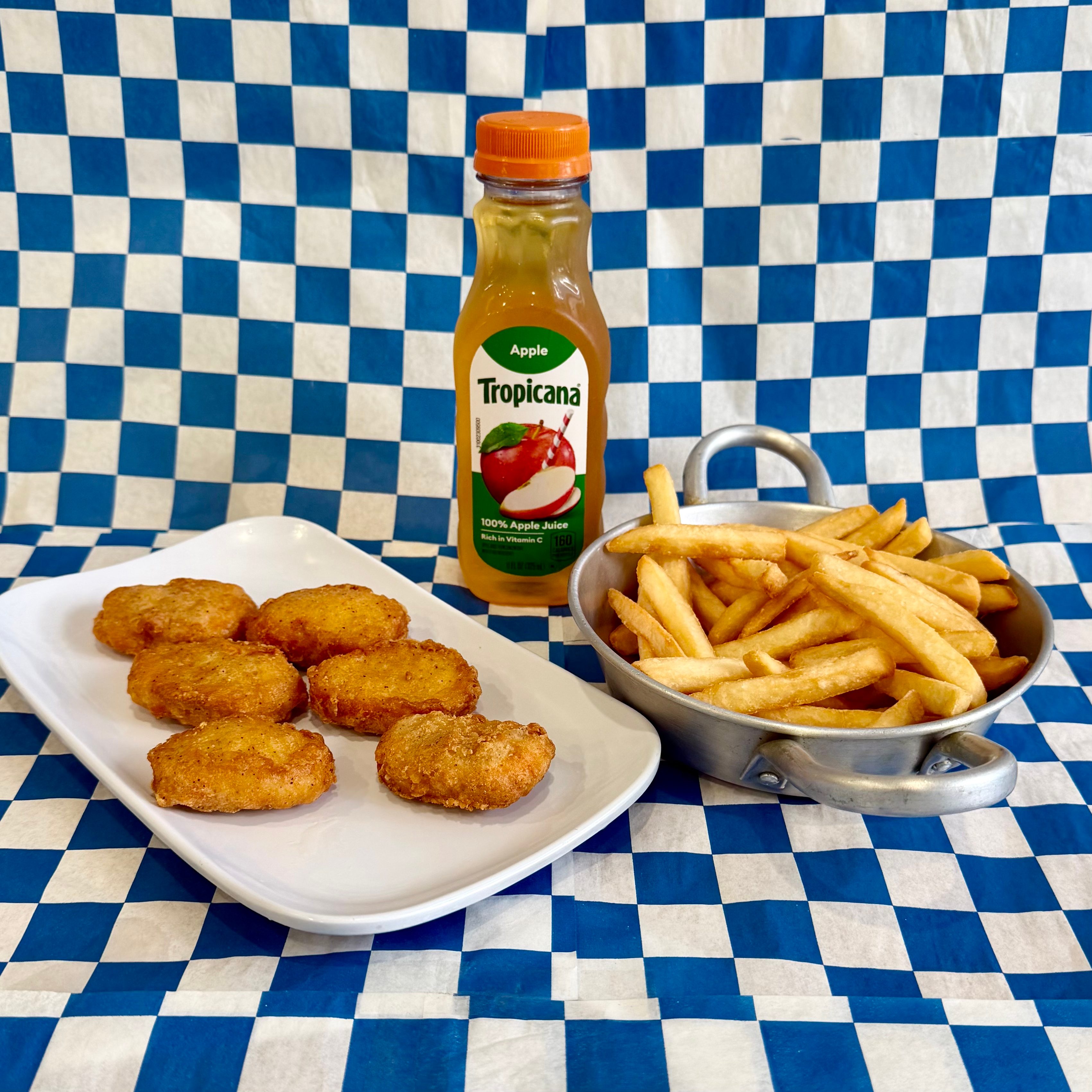 6 Chicken Nuggets With Fries & Juice.
